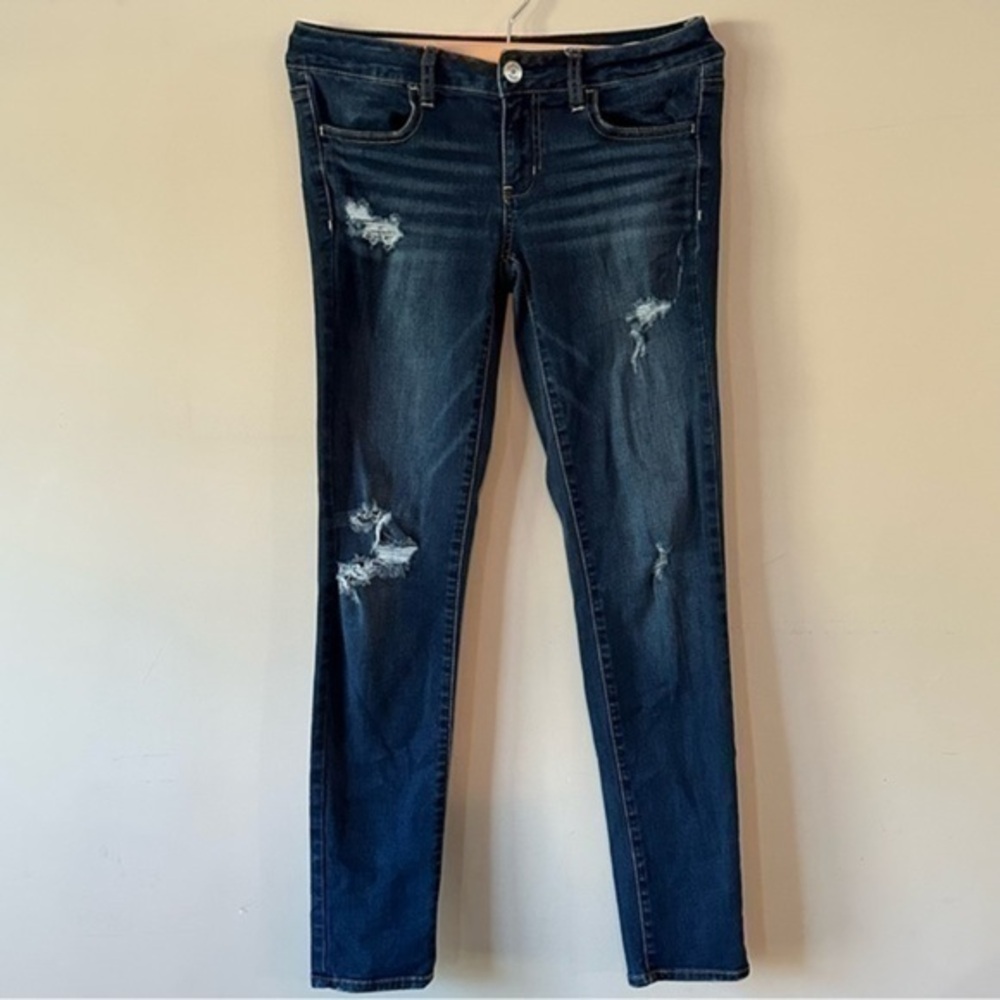 EUC American Eagle Destroyed Faux Patches Jeans Super Stretch size 4